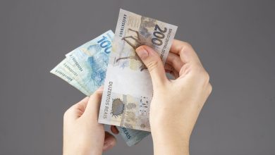 Jornal JA7 - Caixa paga novo Bolsa Família a beneficiários com NIS de final 2